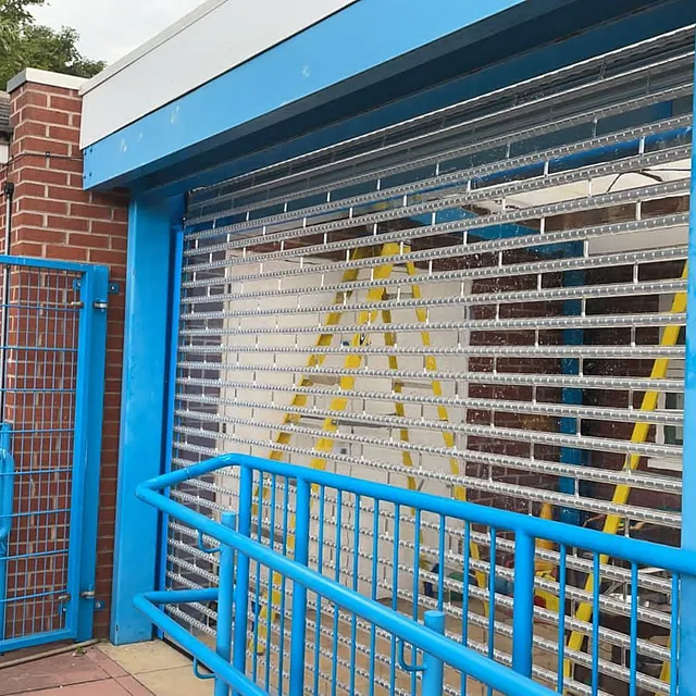 Transparent polycarbonate transpalink shutter at school